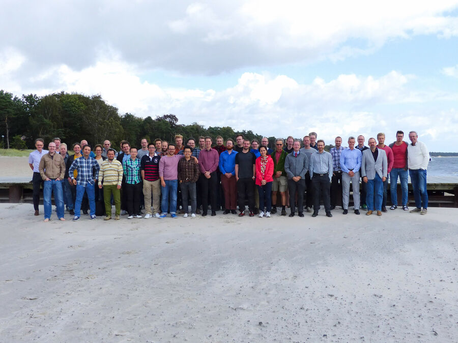 Group photo of participants on the beach of Ystad Saltsjöbad